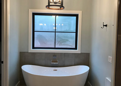 bathroom tub by Greg Avery Homes in Stillwater, OK 74074