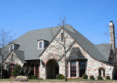 tudor style home by Greg Avery Homes in Stillwater, OK 74074