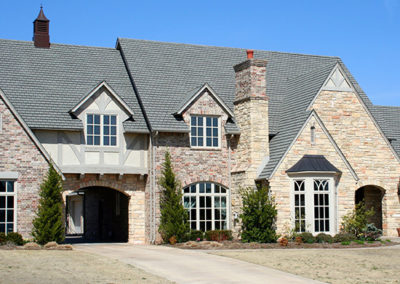 exterior of tudor style home by Greg Avery Homes in Stillwater, OK 74074